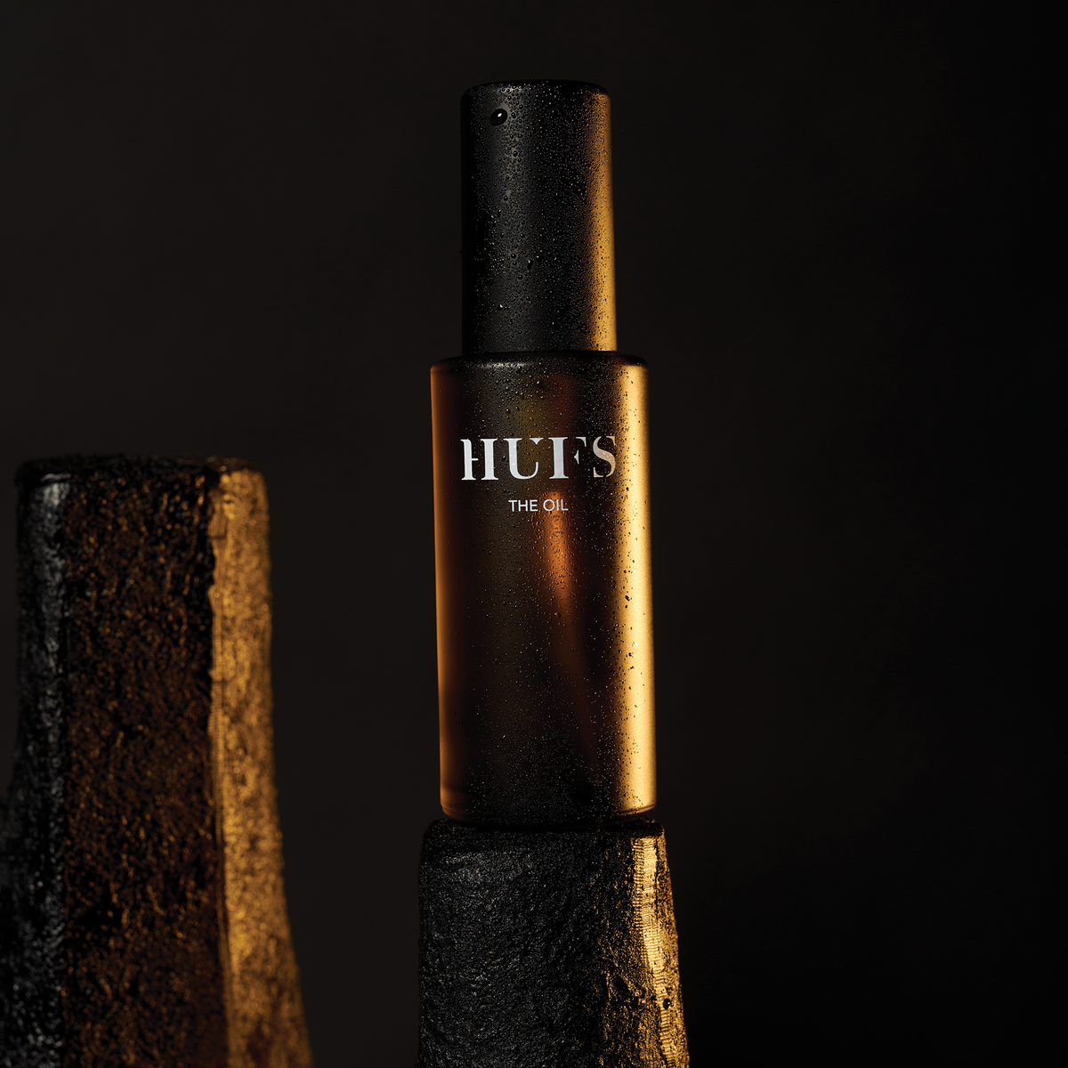 Hufs The Oil 50 ml multiolje sett fra siden